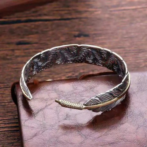 ZAKOL Trendy Hiphop Rock Feather Wing Bangle for Men in Silver