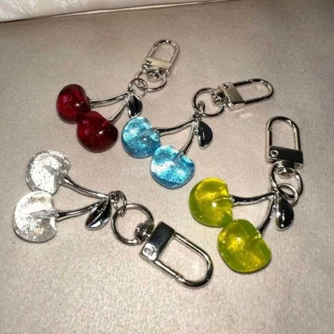 Elegant Gold Cherry Keychain Pendant for Women - Versatile Fashion Accessory